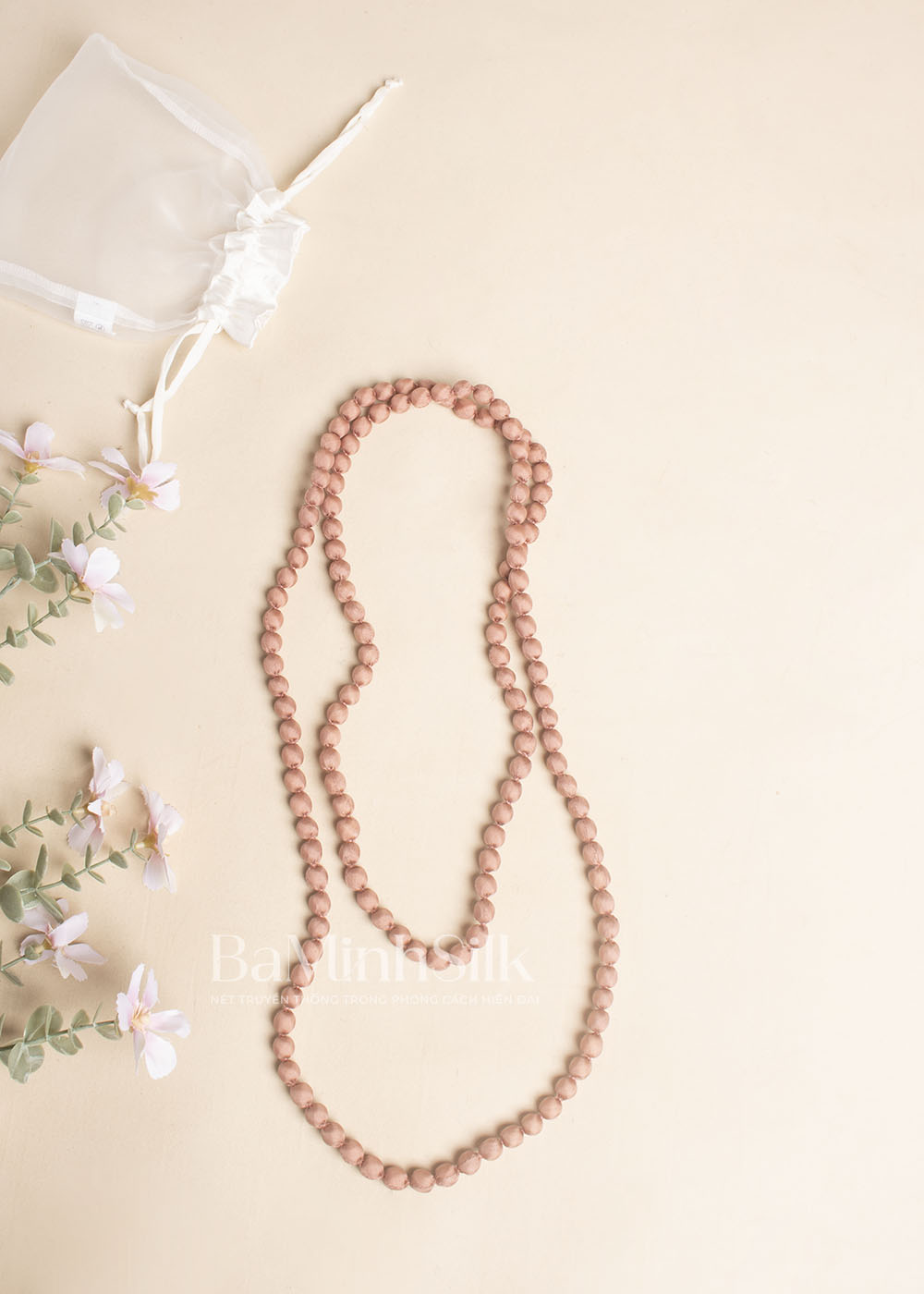 Vòng-lụa-hạt-nhỏ-hồng-vỏ-đỗ
